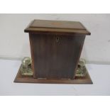 An inlaid Edwardian desk compendium with inkwell and writing slope combined with a letter rack