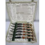 A cased set of Royal Crown Derby Imari pattern knives with pistol grip handles