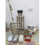 A collection of miscellaneous items including new stainless steel taps, wine rack, emergency light