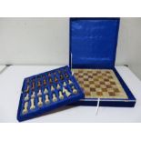 A chess set and board in case