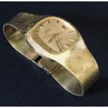 An 18ct gold Omega DeVille automatic watch with date aperture and integrated Milanese mesh strap