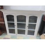 A painted display cabinet/dresser top with glazed doors