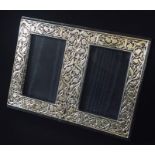 A Britannia silver miniature double photo frame.