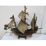 A vintage wooden model of the Santa Maria