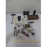 A collection of interesting miscellaneous items including draughts, boot hook, Parker pens, bullets,