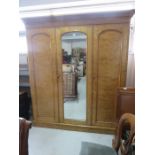 A Victorian mahogany triple wardrobe