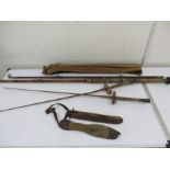 A pair of epees along with an S. Allcock & Co LTD fishing rod and a vintage pair of ice skates