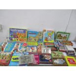 A collection of vintage games, playing cards, puzzles etc.