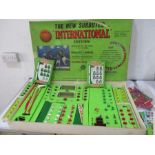 A vintage "Subbuteo table soccer International edition" with extra teams etc. some A/F