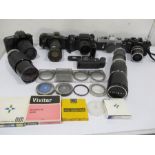 A collection of cameras, lenses including Vivitar and Soligor etc.