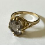A 9ct gold citrine ring.