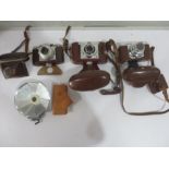 Three cameras in leather cases including Zeiss Ikonwith Contina Prontor-SVS, Super Paxette and