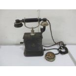 A vintage hand crank telephone
