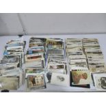 A quantity of various postcards