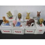 A collection of eight boxed wade figures including Dribbles the Dog, Humpty Dumpty, Tinnie the mouse
