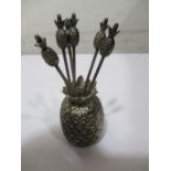 A set of six SCM cocktail olive forks in pineapple holder