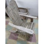 A pair of wooden vintage folding garden chairs