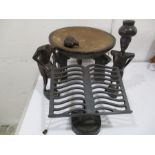 An African stool along with a pair of Bemba carved figures ( 1 A/F) and cast iron cookery book