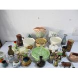A collection of decorative china include Wade whiskey jug, Hornsea, Beswick etc.