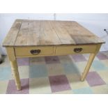 A part painted pine kitchen table with two drawers