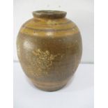 A Chinese stoneware vase depicting a dragon