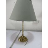 A brass table lamp