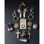 A collection of silver items, charms,rings,fobs, pendant etc.
