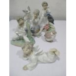 A collection of eight Lladro figures ( 1 A/F) along with a Nao group of geese