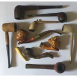 An assortment of smoking pipes.