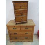 A satinwood chest of drawers along with a pine bedside cabinet