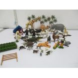 A collection of Britains animals, palm trees etc.