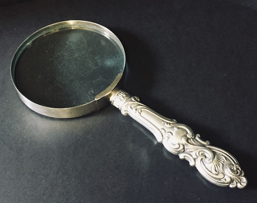 A collection of silver and SCM items including a magnifying glass, strainer, medallions etc. - Image 9 of 11