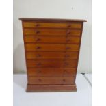 An Edwardian specimen cabinet with 8 drawers