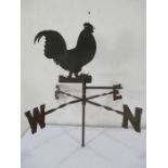 A wrought iron cockerel weathervane