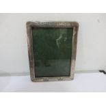 A hallmarked silver photo frame A/F - 25cm x 19cm approx