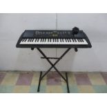 A Yamaha PSR-B2 keyboard and stand