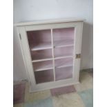 A glazed painted hanging cupboard