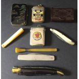 A small collection of vestas, snuff box, cigarette holder etc