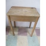 A vintage wooden school desk