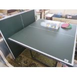 A half sized "Butterfly" table tennis table with accessories