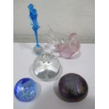 A collection of five paperweights including Caithness, Murano, Isle of Wight etc