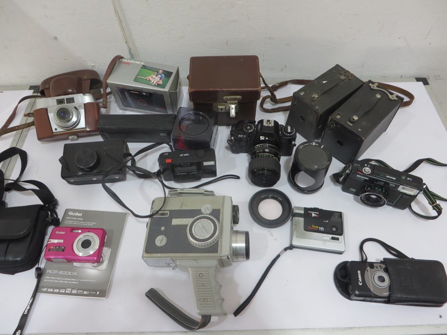 A collection of various cameras, lenses etc including Kodak, Canon, Rollei, Brownie, Sigma