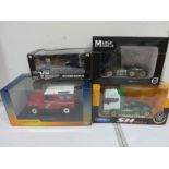 Four boxed various model vehicles including Land Rover Defender 50, Welly Scania V8 R730, Marge