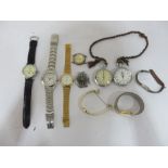 A collection of various wristwatches and stopwatches