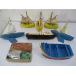 A Hornby clockwork boat, two star yachts along with various other boats