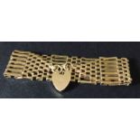 A 9ct gold gate bracelet. Weight 25.6g