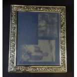 A hallmarked silver photo frame, 32cm x 27cm