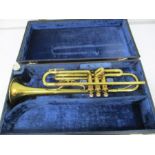 A cased Barnes and Mullins "B&M Champion" trumpet- case A/F