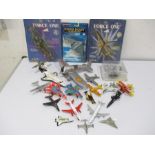 A collection of die cast and other aeroplanes, space shuttle etc.