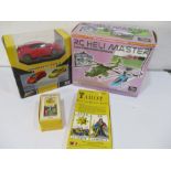 Tarot cards, RC Heli Master flight simulator game and a Honda Civic type R RC model